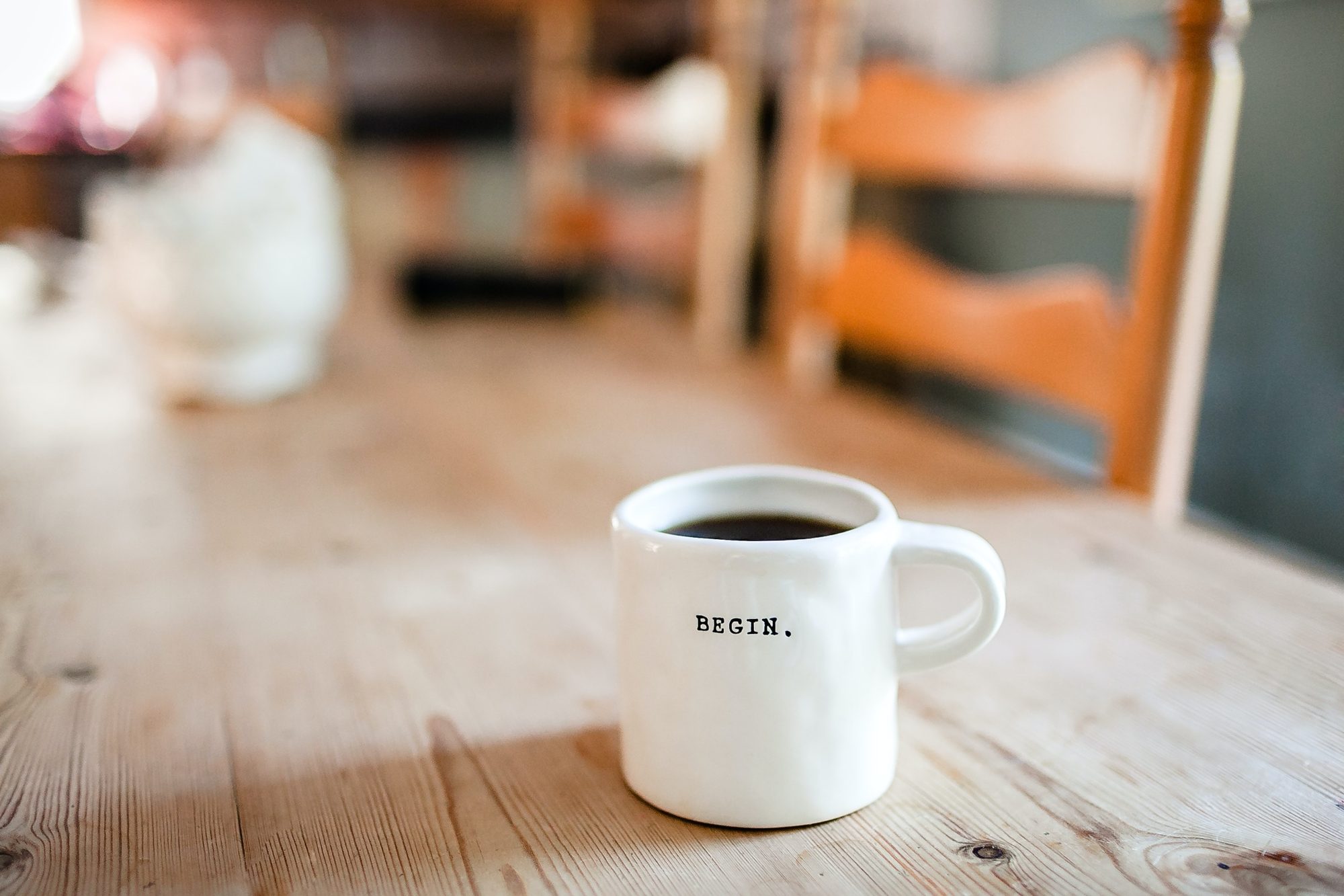 Caneca com a palavra Begin